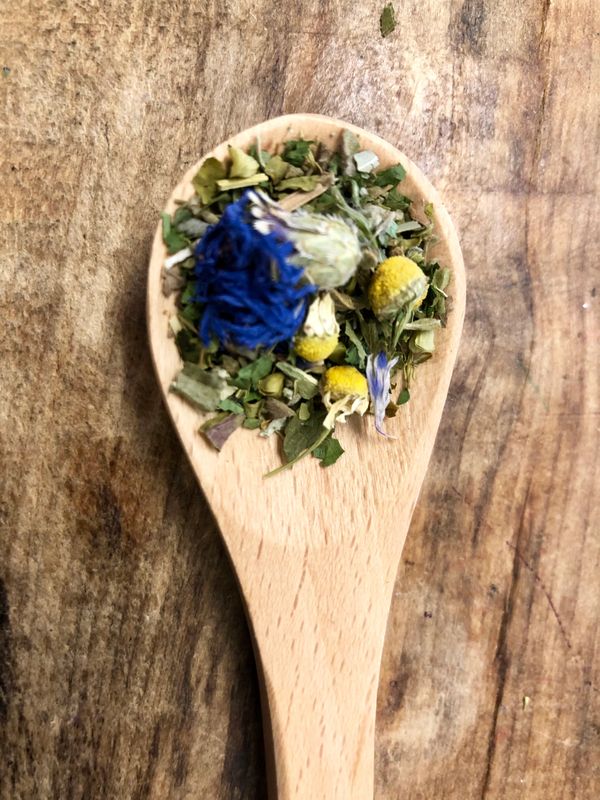 mix of herbs on a spoon