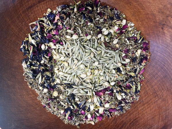 a mix of medicinal herbs in a bowl