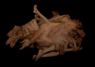 Multiple blurred images of a person overlapping against a black background.