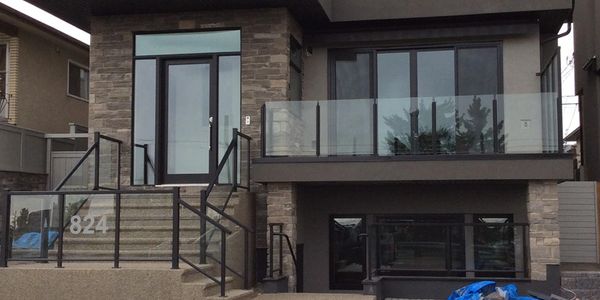 Topless glass railing and vinyl decking
