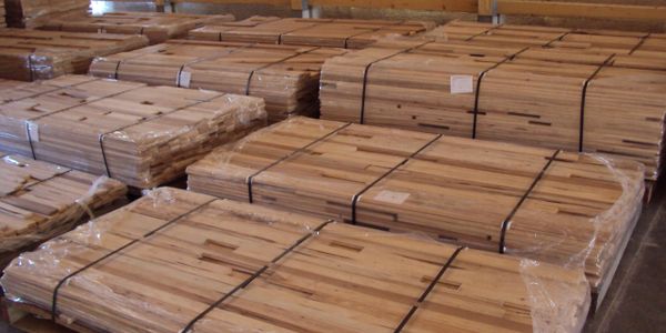 A scenic view of a mountain landscape during sunset with vibrant colors in the sky.