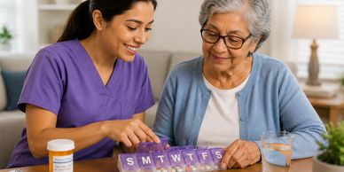 Caregiver helps elderly woman organize medication in a pill organizer.