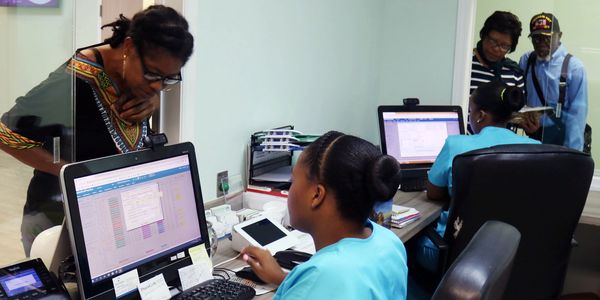 Staff at work helping patients