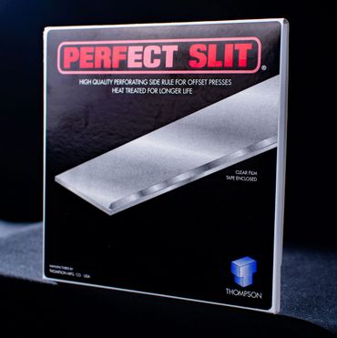 Packaging for a Perfect Slit perforating side rule by Thompson.