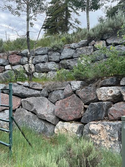 Rock retaining walls hill retention