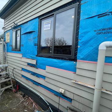 Weatherboard and window repairs Northcote