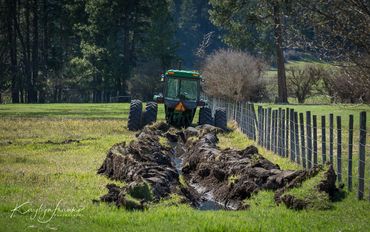 agriculture, meadow, mud, New Meadows, Stuck John Deere tractor, Hwy 95, Idaho, 