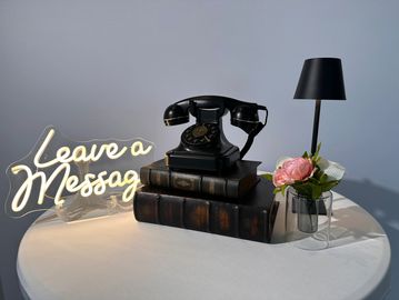leave a message sign displaying audio guest book rental