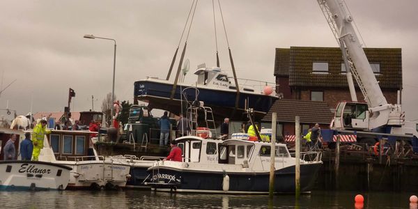 Club boats being lifted out for annual maintenance