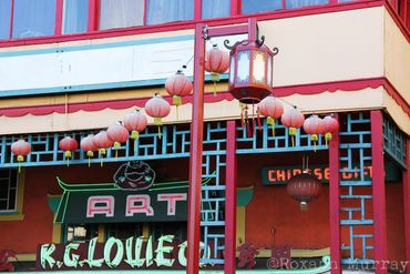 Red lanterns leading to an art gallery