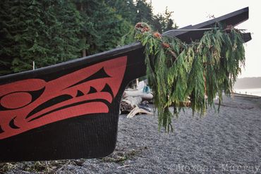 A cedar wreath hangs on a canoe at Owen Beach during Canoe Journey.