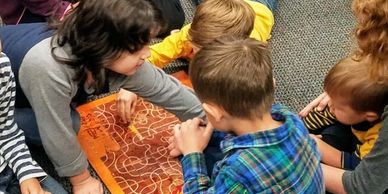 Children learn much from playing the game "Tsuro".