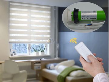 Remote-controlled smart blinds with motor.