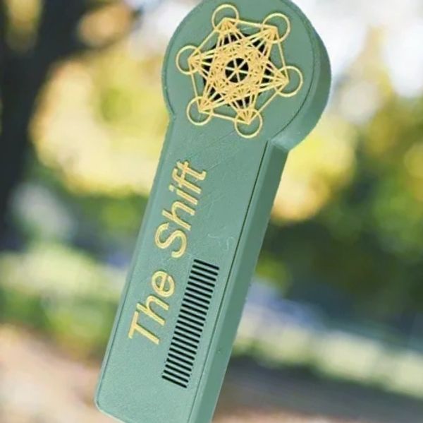 A green device labeled 'The Shift' with a geometric pattern on top.