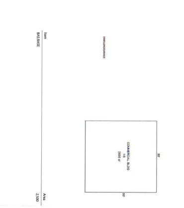 Site plan showing commercial building layout.
