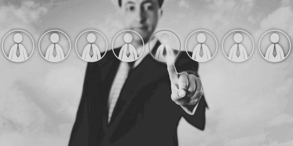 Business person selecting resources.
