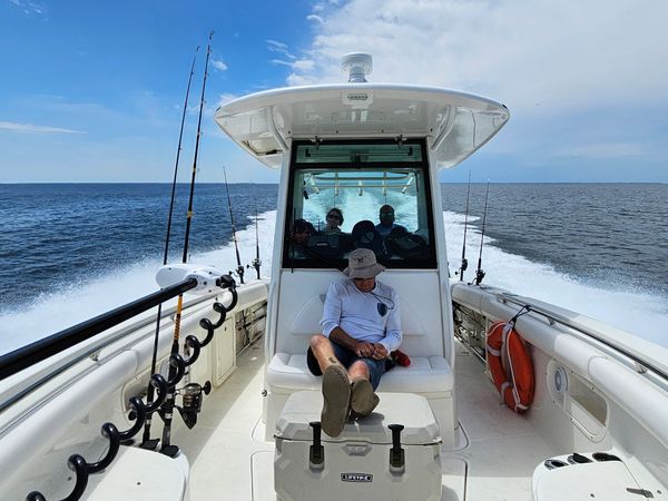 Blue sky on 32 ft Boston Whaler 320 Outrage, safe and stable and fast boat.