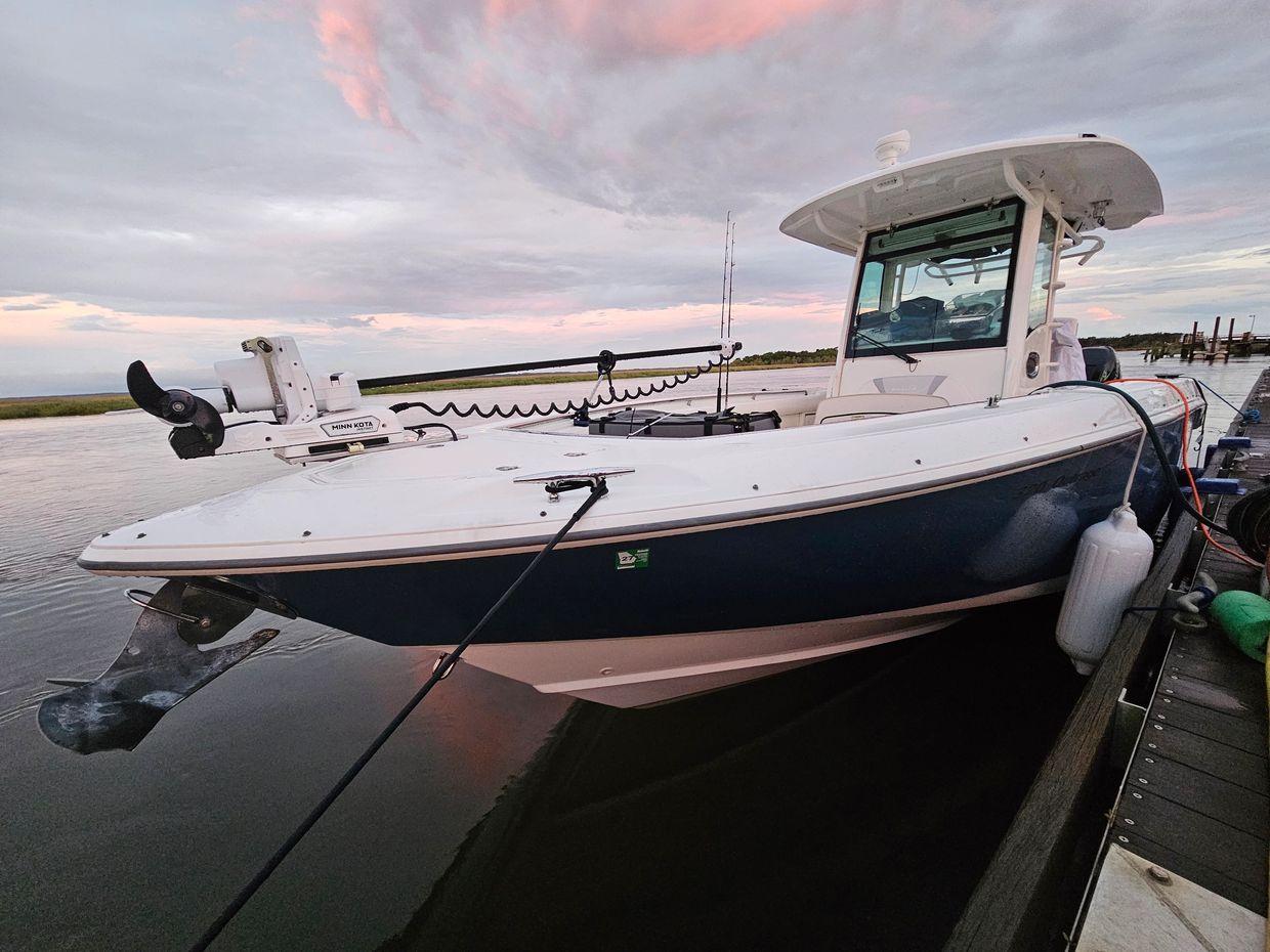 THE DOUBLE DOWN CHARTERS BOAT SIDE VIEW, 32 foot Boston Whaler Outrage.