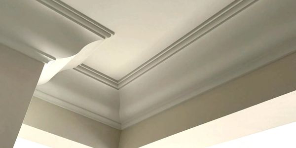 Elegant ceiling design with layered molding.