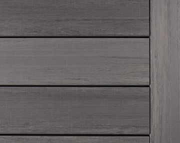 Dark gray wooden panel texture with horizontal and vertical alignment.