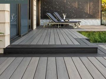 Modern outdoor deck with lounge chairs.