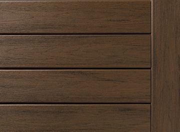 Close-up of dark wooden plank surface.
