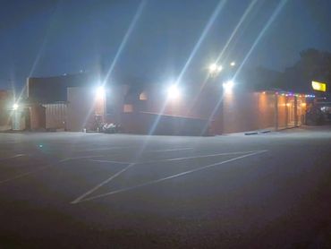 Commercial parking lot lighting installation completed by Cox Electric, Heating & Cooling for a Sout
