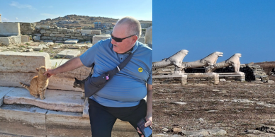 My husband just showing that even after hundreds of years, the cat is still a cherished animal upon 