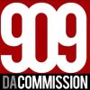 909 DA COMMISSION text logo on red background.
