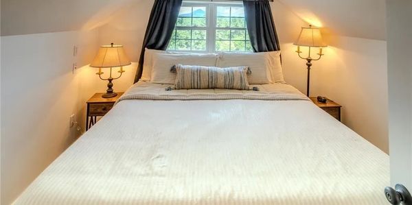 Primary Bedroom overlooking Grandfather Mountain. 
( California King Bed )