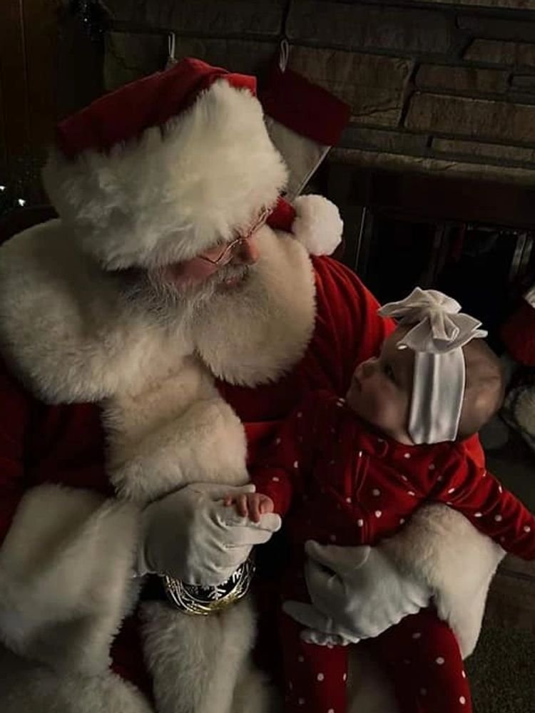Northern Star Santa with his favorite little elf!