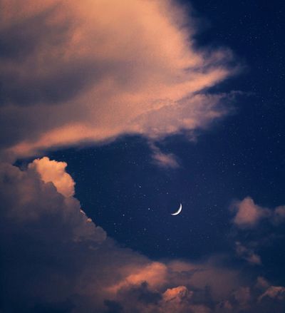 Sky with stars and crescent moon