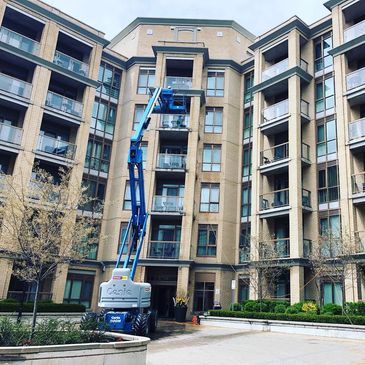 Commercial window cleaning. Cleaning using a lift. 