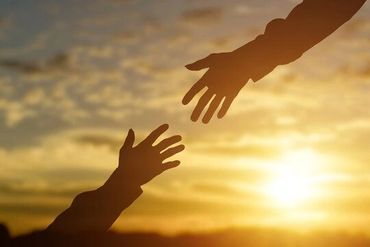 Two men trying hold the hand 