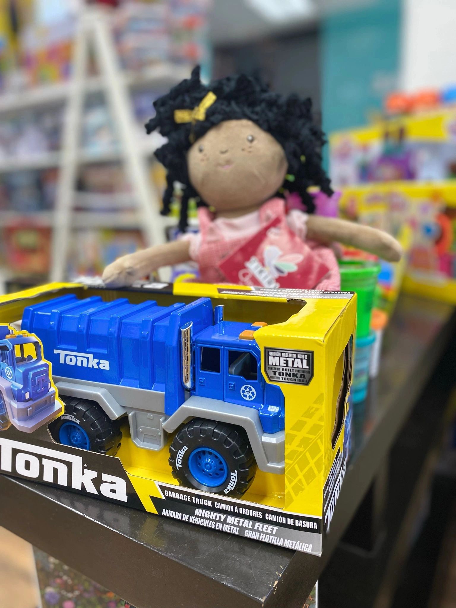Doll and Tonka truck