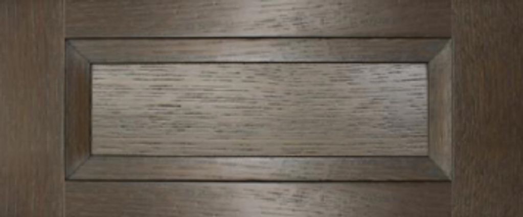 Close-up of a wooden surface with a rectangular pattern.