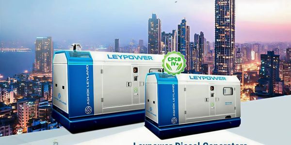 Two Leypower diesel generators against city skyline.