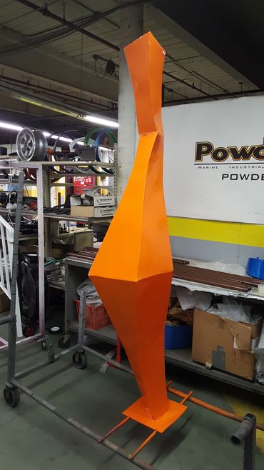 Steel art work powder coated bright orange 