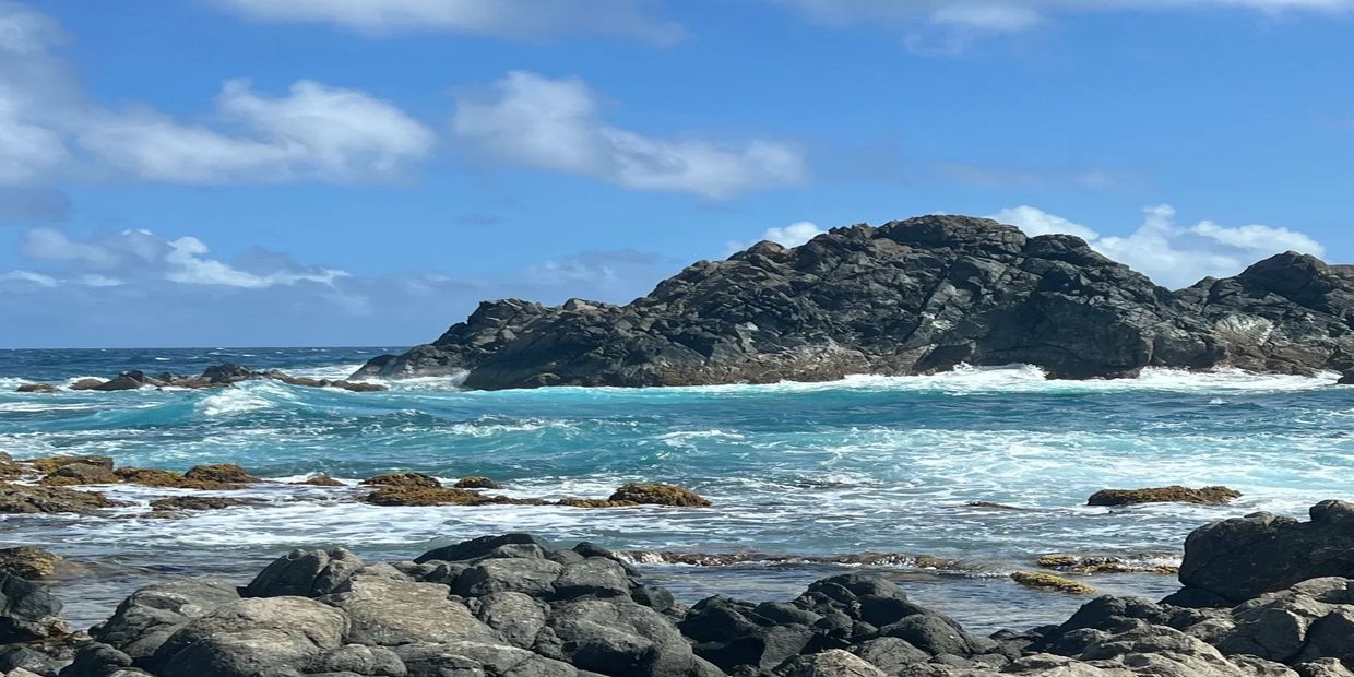 Natural Pool, rock formation with blue water 