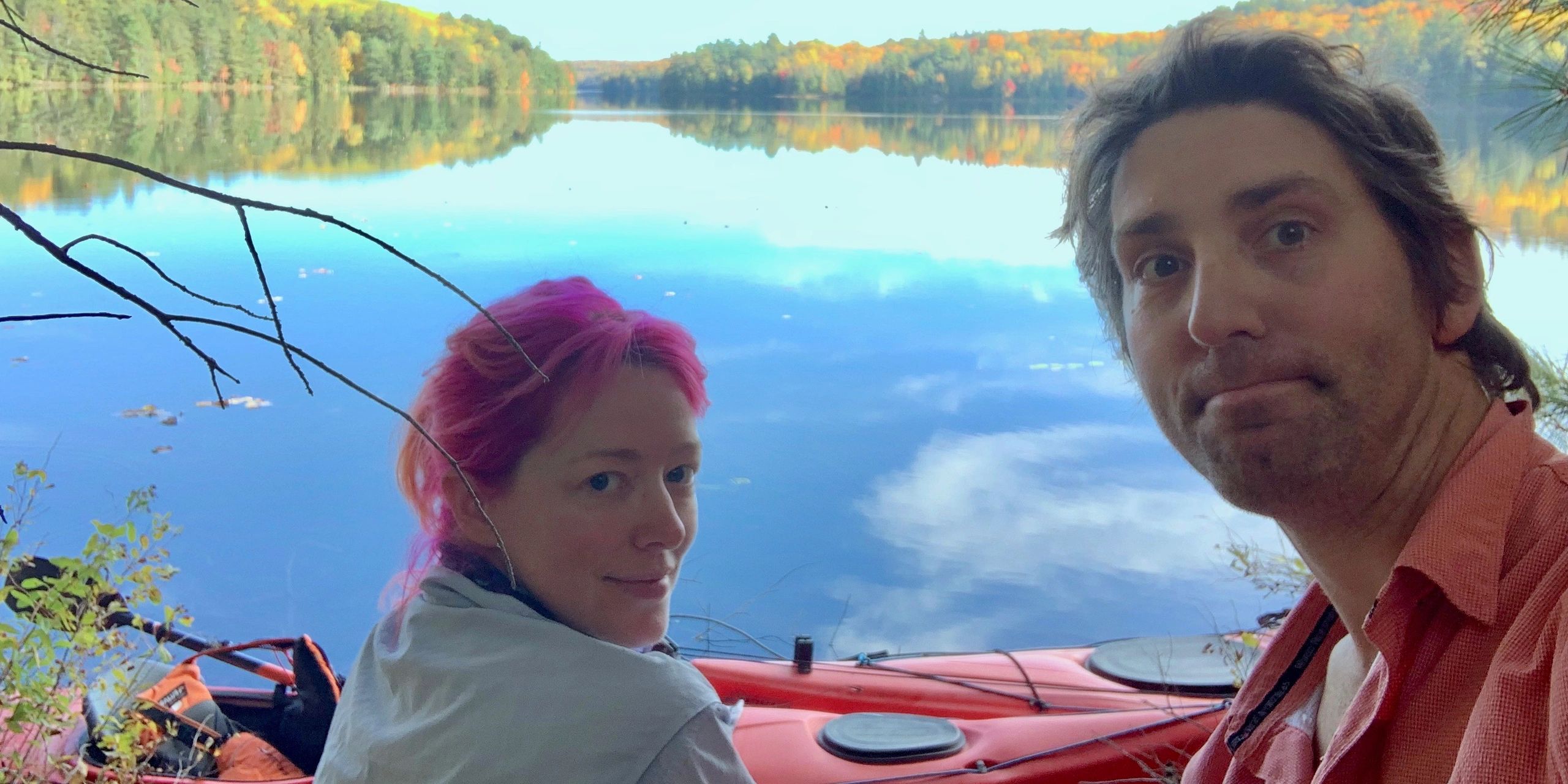 Heather and Steve by a kayak by the water in Northern Ontario