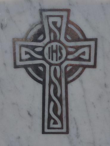 lead lettering Celtic cross.