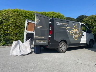 Gwenen Gardens branded van parked in a maintained Cornish garden.