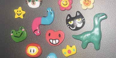 Clay art in the form of magnets is always a good choice!