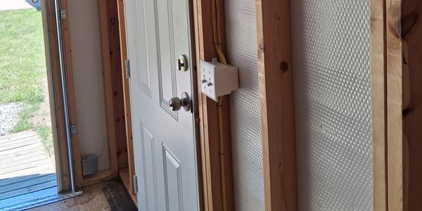 Shed with electrical switch and outdoor light