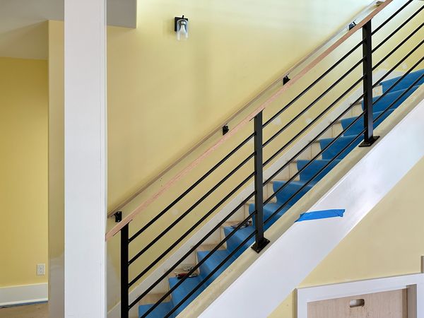Custom wood grab rail & stair rails with horizontal pickets and custom wood rail cap