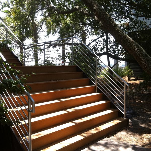 Stair rails th horizontal pickets and standard metal rail cap