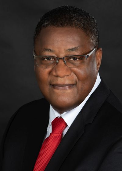 A photo of a man with black background