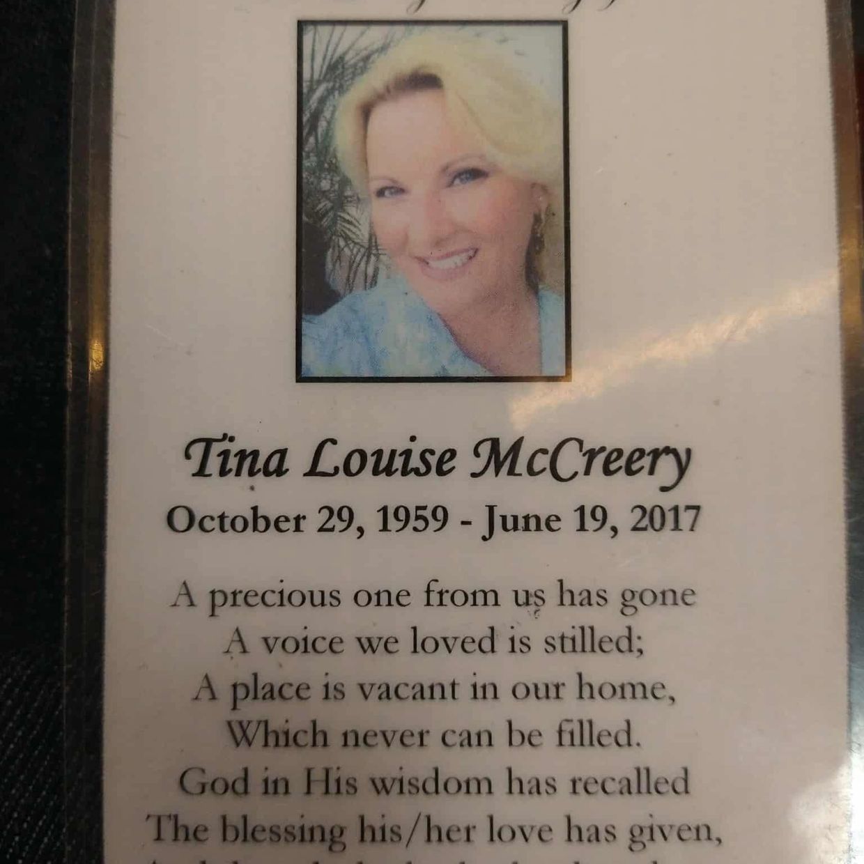 Memorial card honoring Tina Louise McCreery with a heartfelt poem and photo.