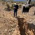A civil engineer is collecting data during a percolation Test. 