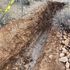 Very hard caliche during a percolation test in Tucson. 